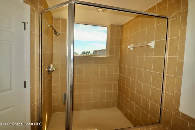 a dining table with chairs and window