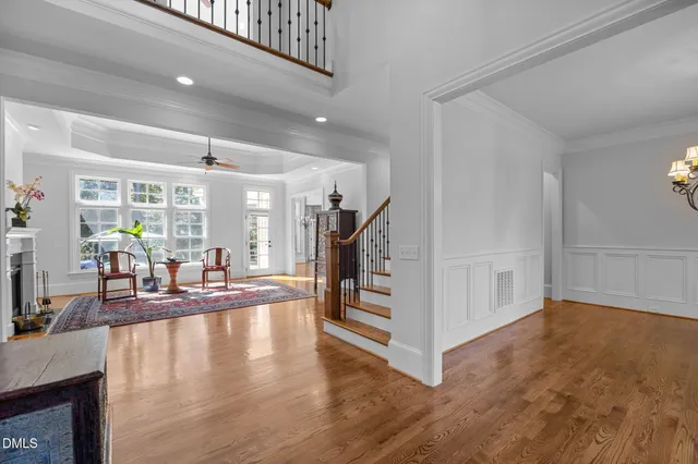 an empty room with a window and a couch