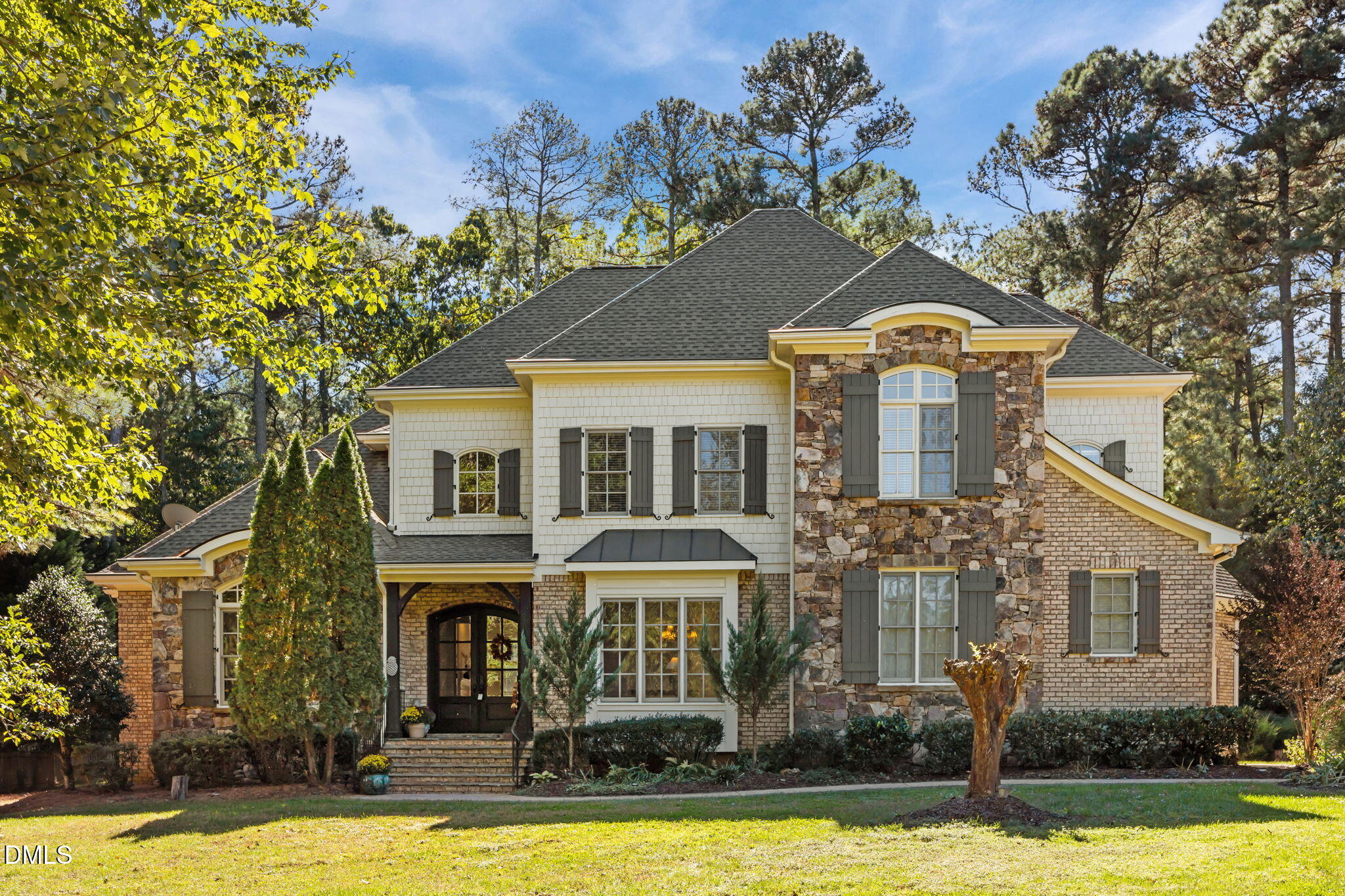10101 Lobley Hill Lane Raleigh, NC 27613 - Photo 2 of 89 a front view of a house with swimming pool and porch