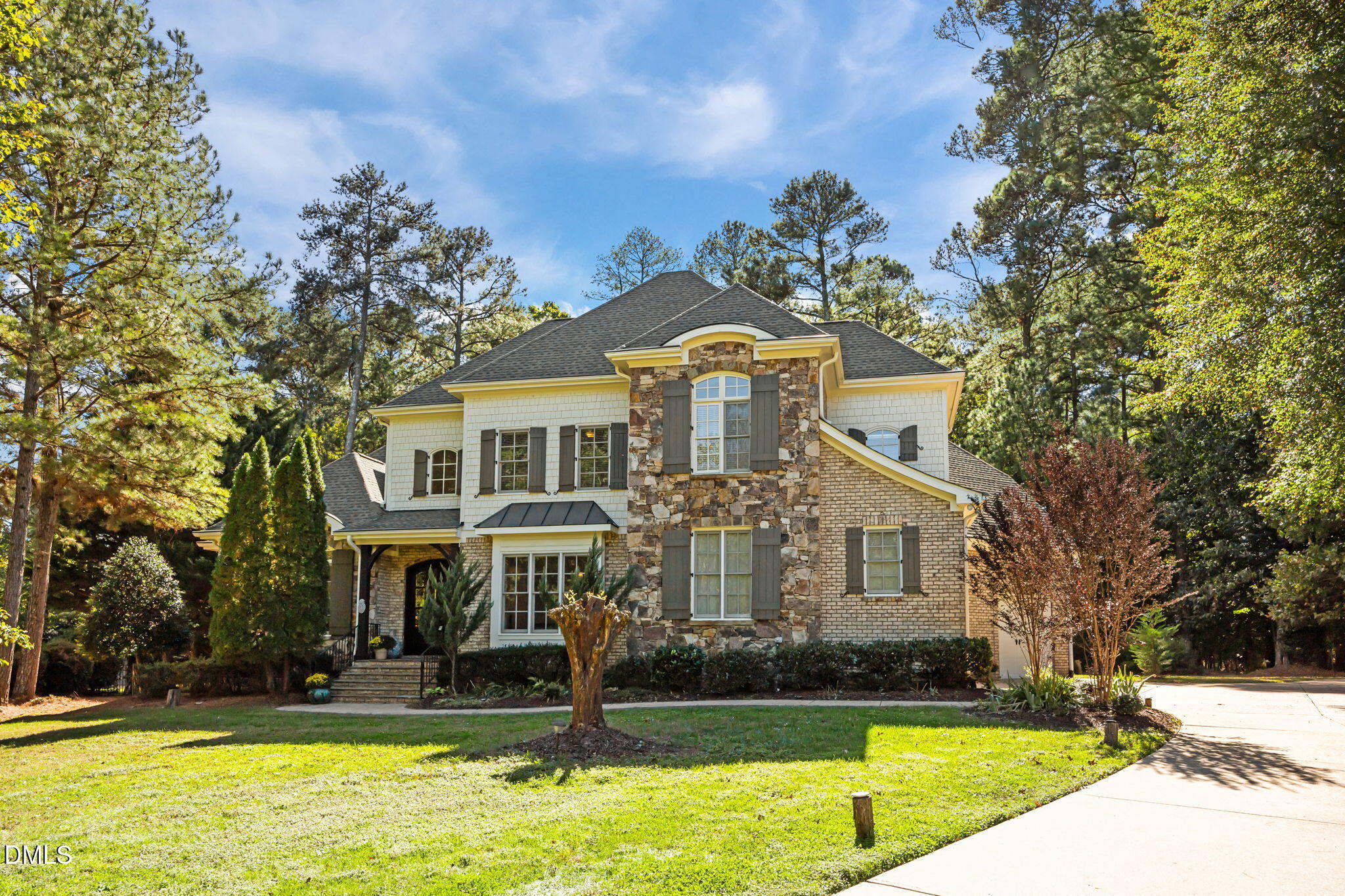 10101 Lobley Hill Lane Raleigh, NC 27613 - Photo 4 of 89 a front view of a house with swimming pool