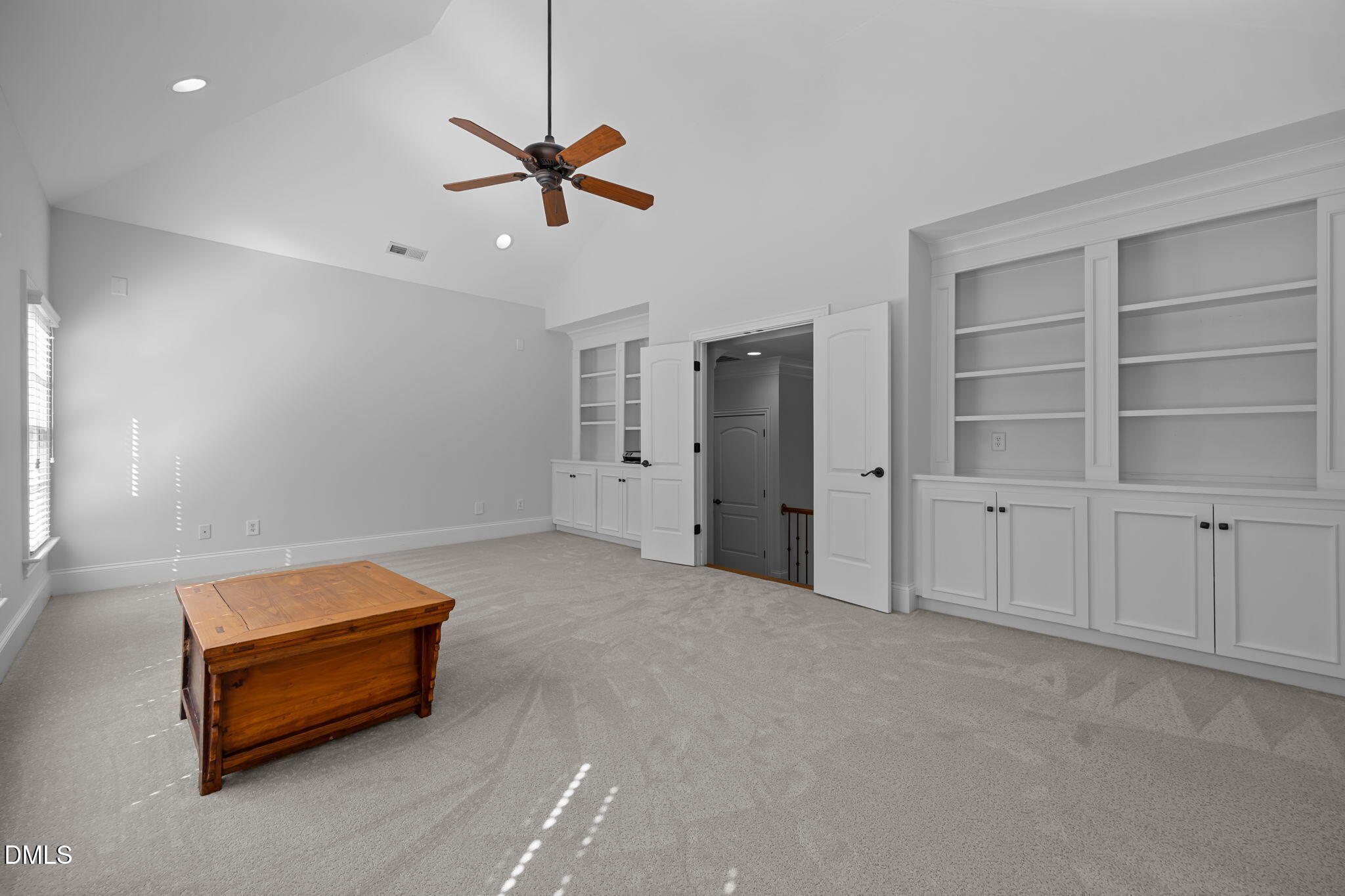 10101 Lobley Hill Lane Raleigh, NC 27613 - Photo 50 of 89 a room with furniture and a ceiling fan