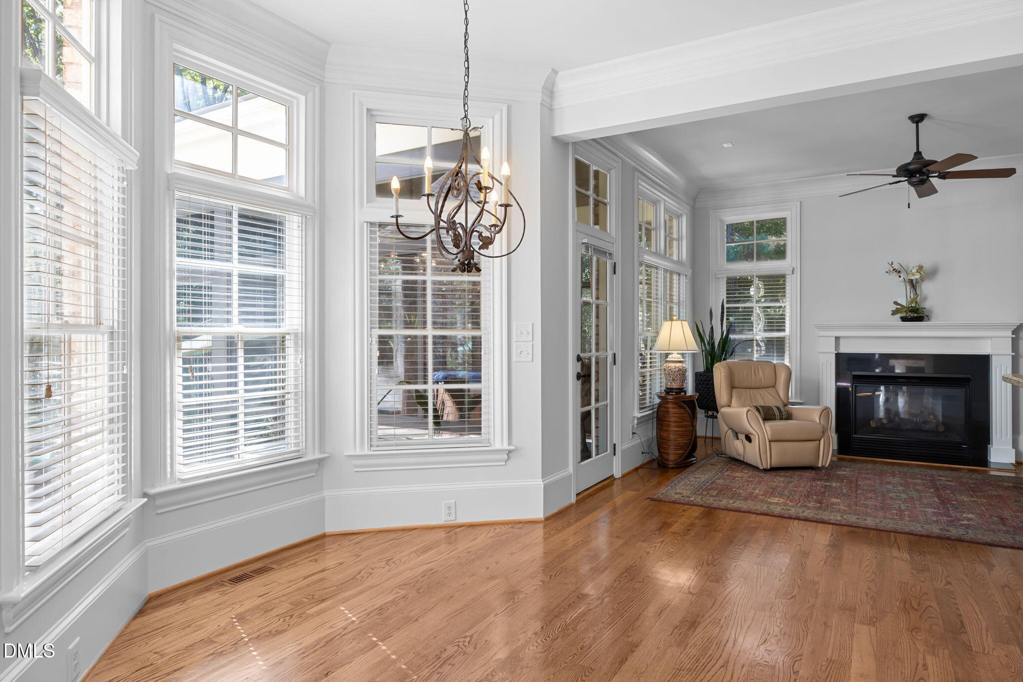 10101 Lobley Hill Lane Raleigh, NC 27613 - Photo 56 of 89 a view of a livingroom with a fireplace and windows