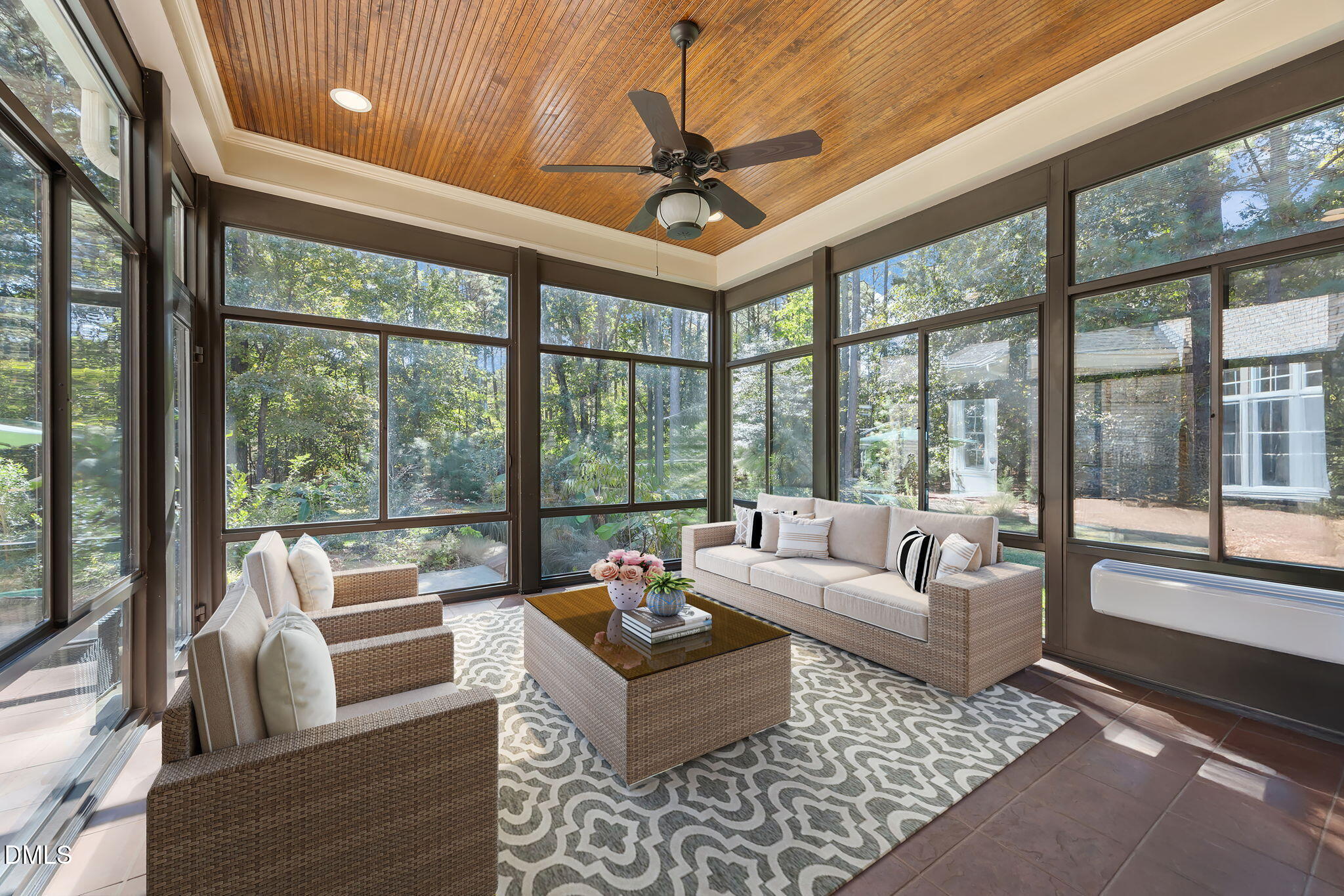 10101 Lobley Hill Lane Raleigh, NC 27613 - Photo 69 of 89 a living room with furniture and floor to ceiling windows