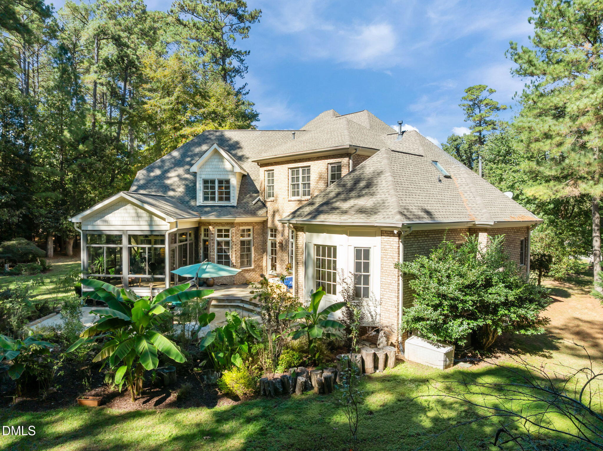 10101 Lobley Hill Lane Raleigh, NC 27613 - Photo 85 of 89 a front view of a house with a garden