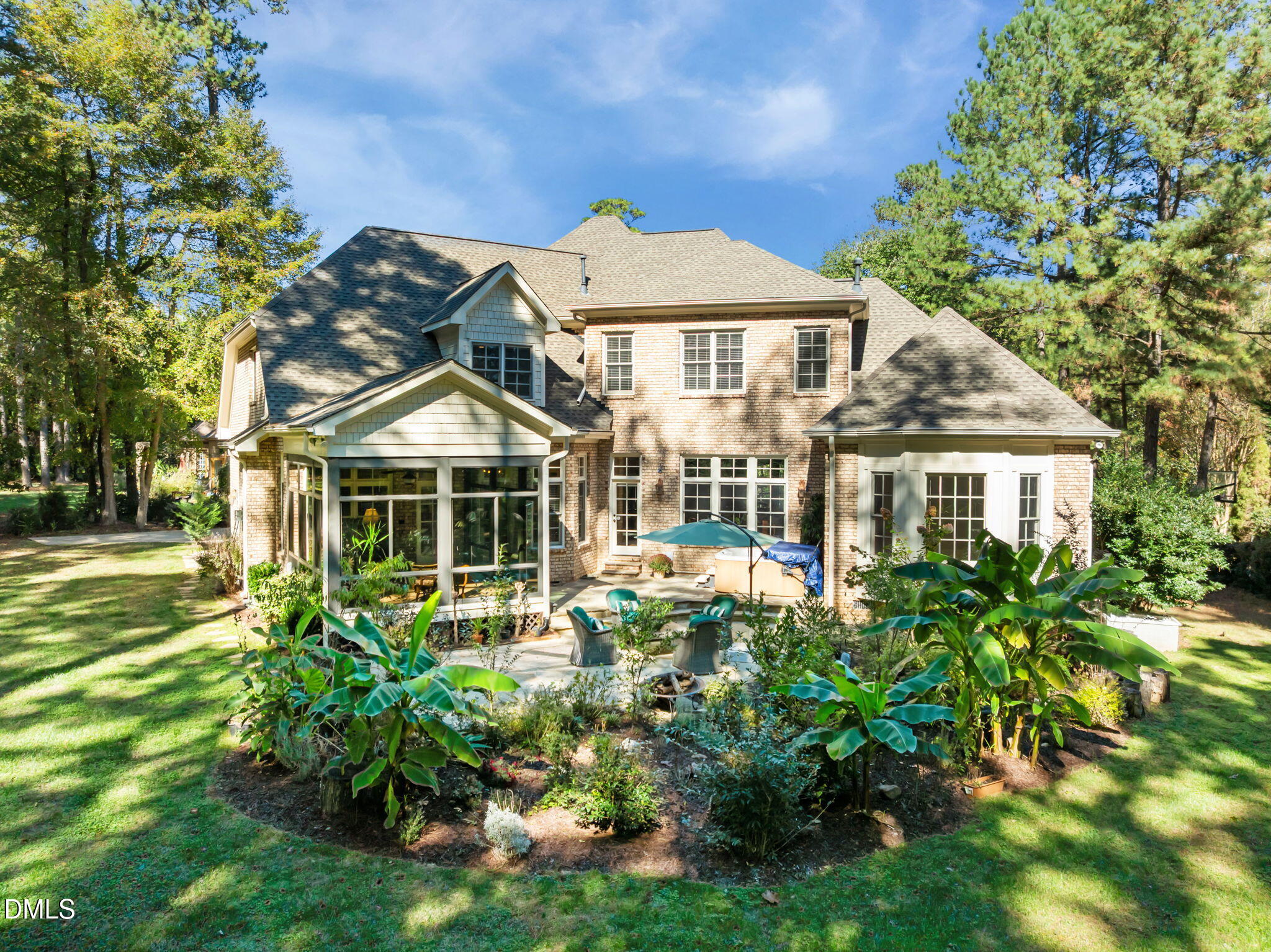 10101 Lobley Hill Lane Raleigh, NC 27613 - Photo 86 of 89 a front view of a house with a garden