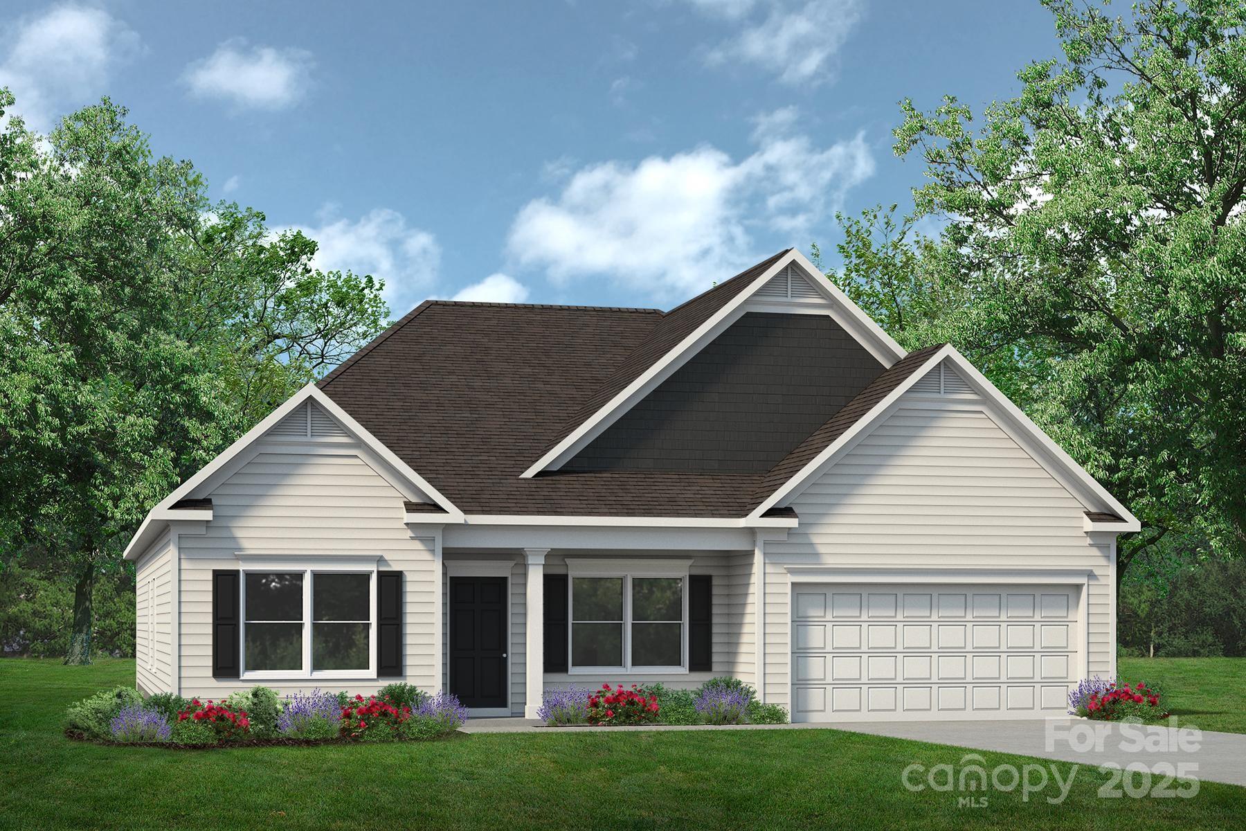 6209 Busch Way Midland, NC 28107 - Photo 2 of 17 a front view of a house with a yard and garage