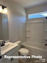 6209 Busch Way Midland, NC 28107 - Photo 6 of 17 a bathroom with a sink and a toilet