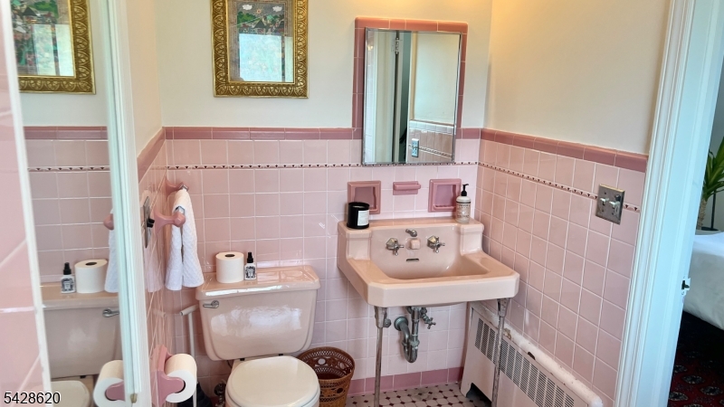21 Payne Road Newton, NJ 07860 - Photo 18 of 29 a bathroom with a sink toilet and mirror