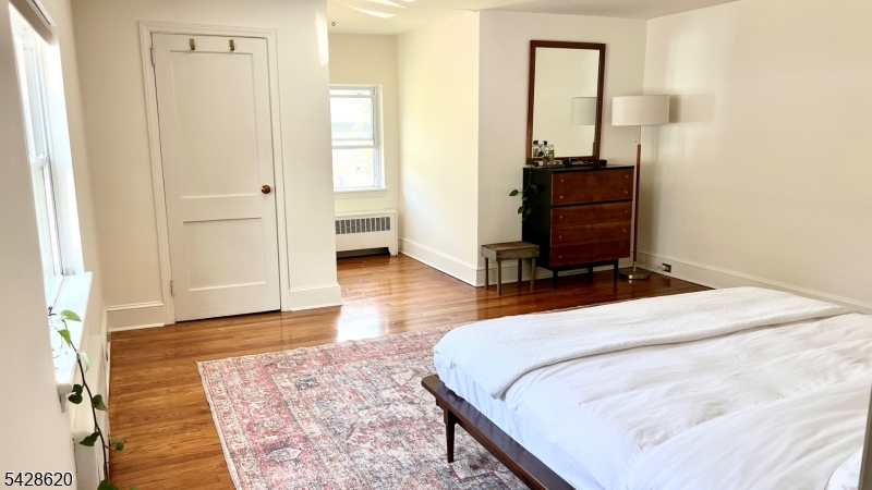 21 Payne Road Newton, NJ 07860 - Photo 25 of 29 a bedroom with a bed and wooden floor