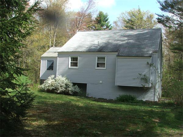 148 Adams Road Oakham, MA 01068 - Photo 2 of 14 a view of a house with a garden