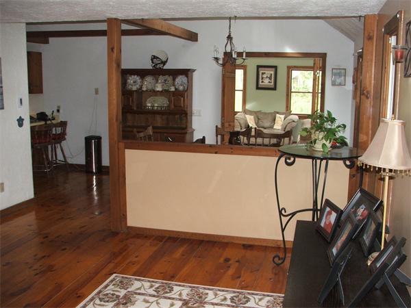 148 Adams Road Oakham, MA 01068 - Photo 7 of 14 a view of a living room and a wooden floor