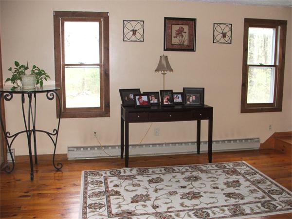 148 Adams Road Oakham, MA 01068 - Photo 8 of 14 a view of a workspace with wooden floor