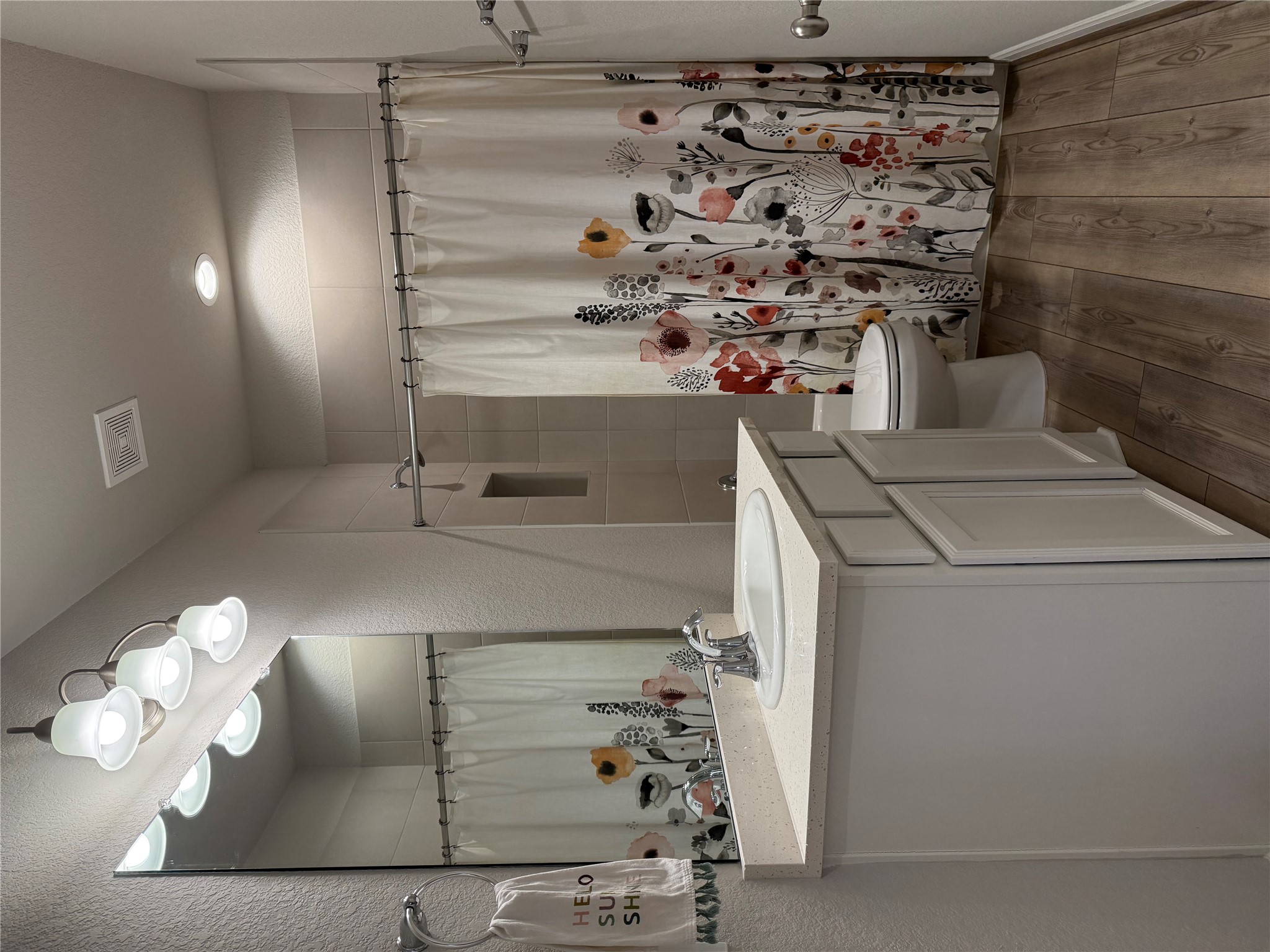 2336 Hagerman Road Conroe, TX 77384 - Photo 13 of 35 a bathroom with a sink toilet and shower