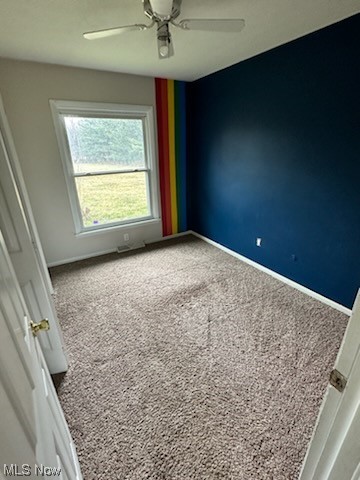 4396 Rootstown Road Rootstown, OH 44272 - Photo 9 of 21 Spare room with carpet floors and ceiling fan