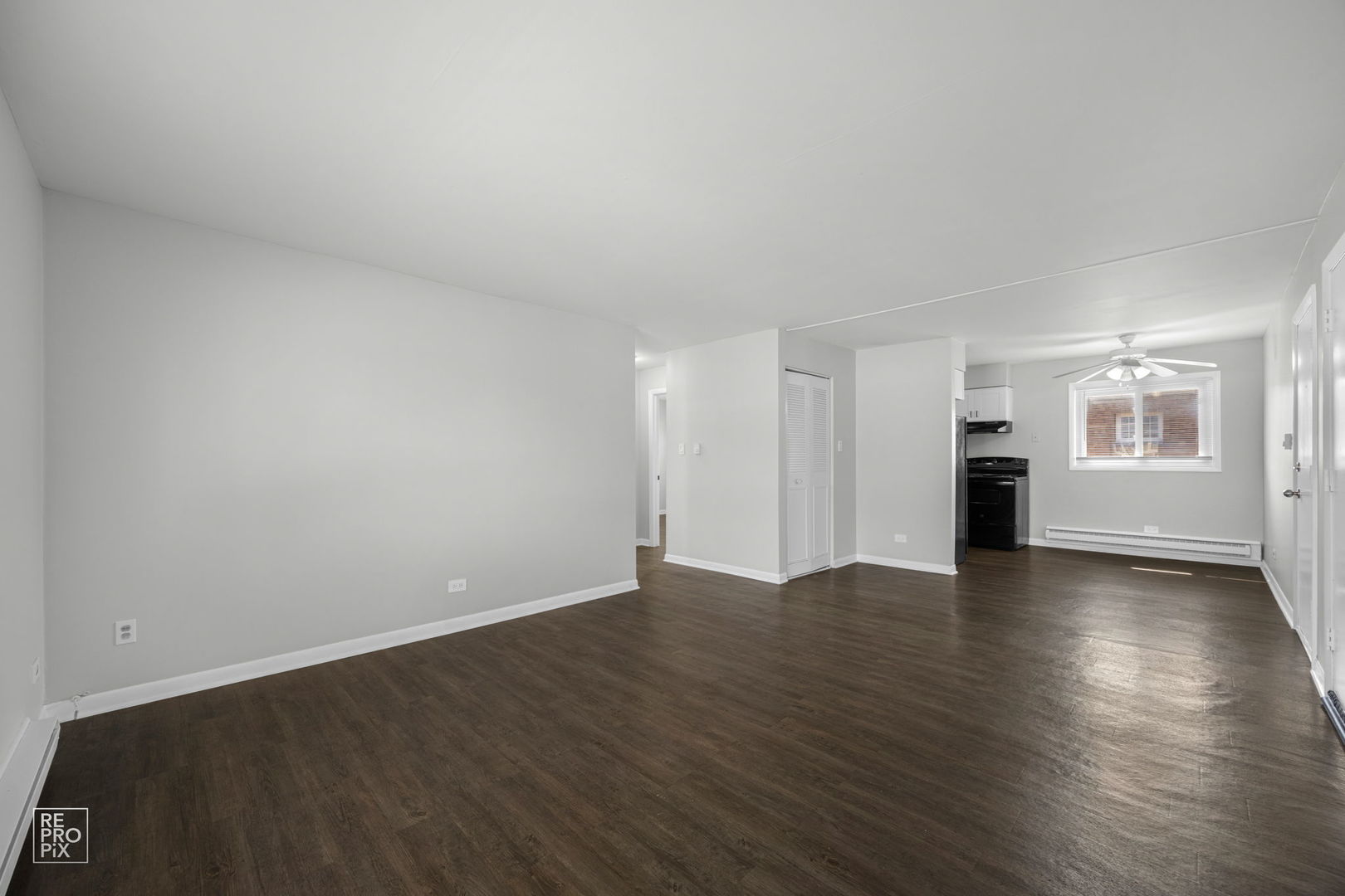 6315 Joliet Road, Unit 6 Countryside, IL 60525 - Photo 3 of 10 wooden floor in an empty room