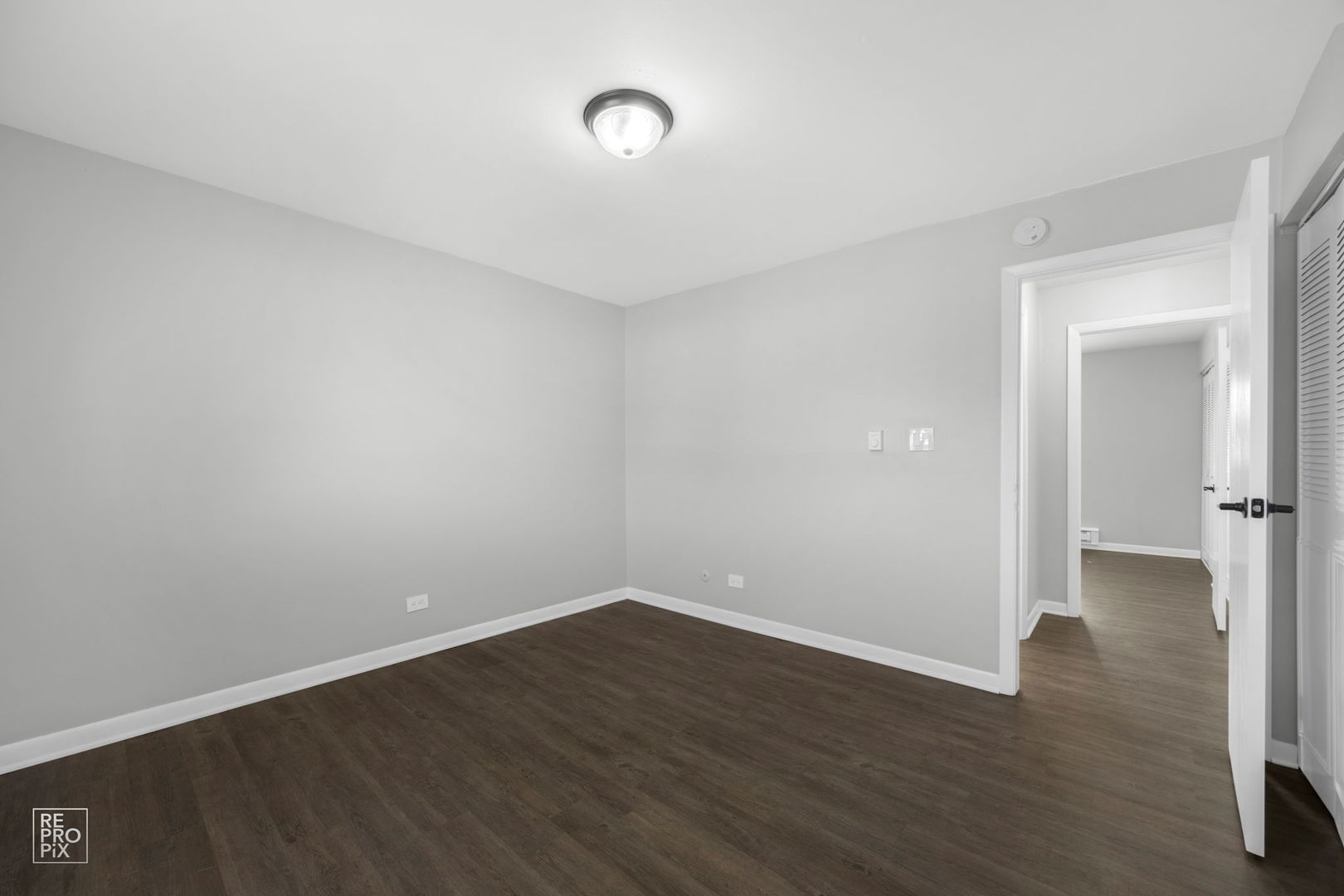 6315 Joliet Road, Unit 6 Countryside, IL 60525 - Photo 7 of 10 a view of a room with wooden floor