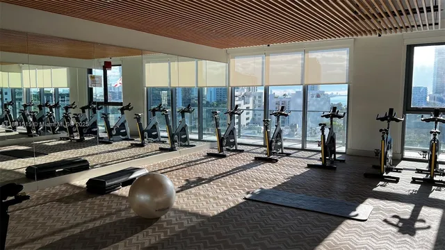 a view of a room with gym equipment