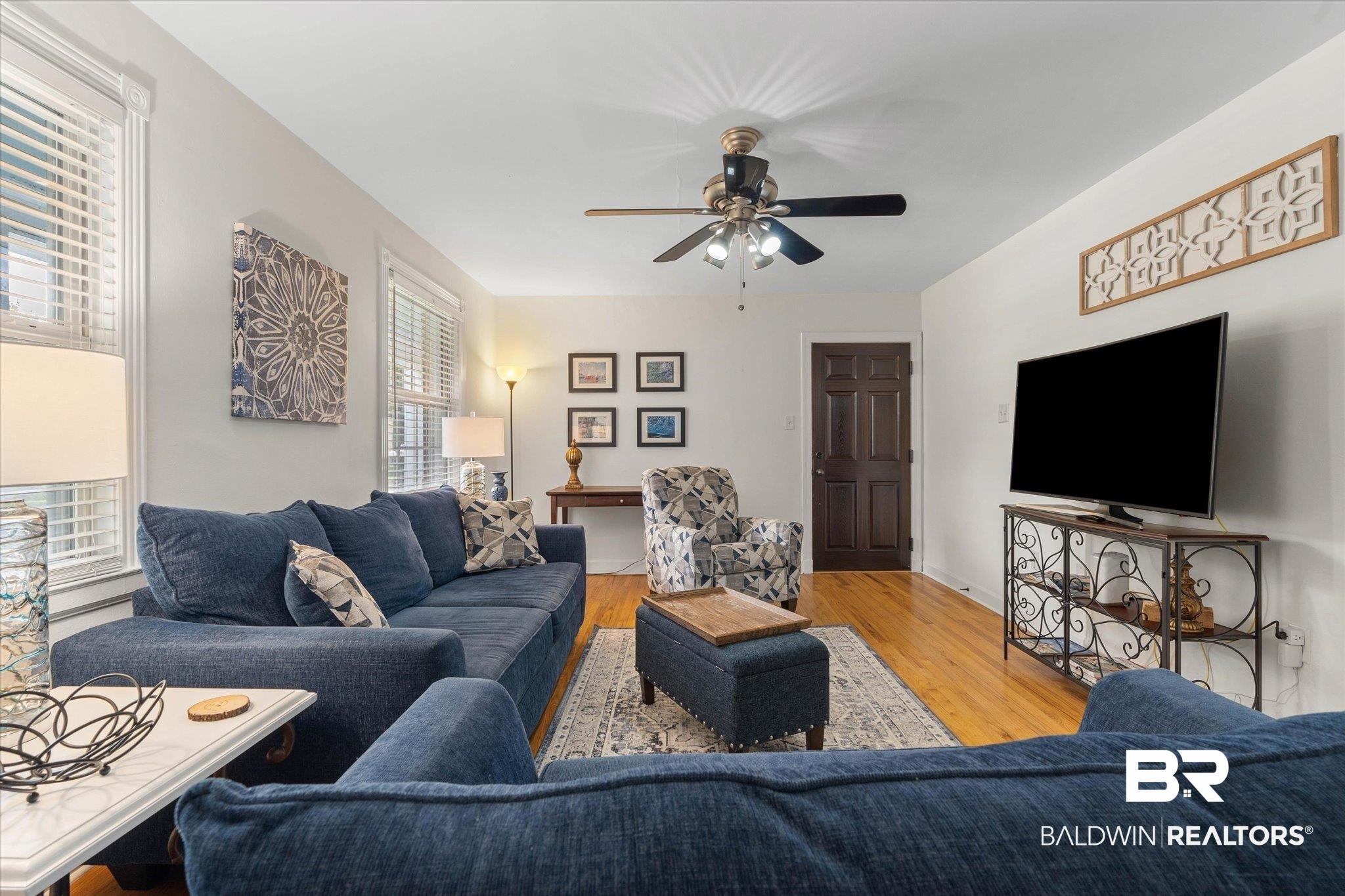 214 Upham Street, Unit 18A Mobile, AL 36607 - Photo 4 of 29 Living room featuring ceiling fan and light wood-style flooring