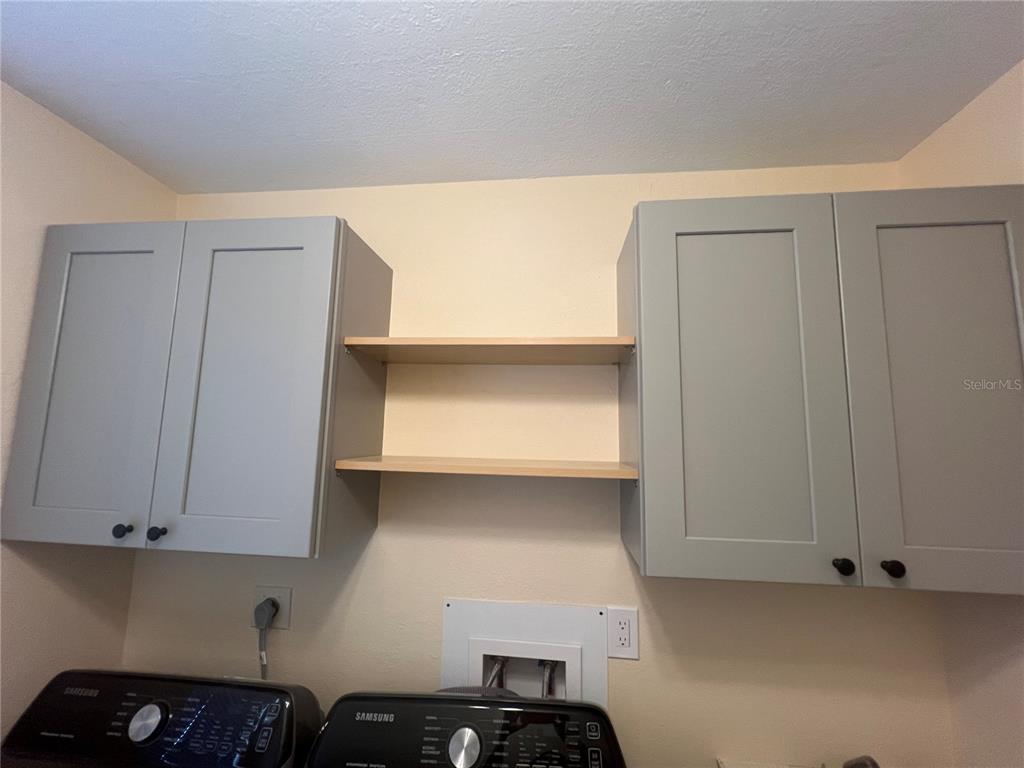 2533 Rio Tiber Drive Punta Gorda, FL 33950 - Photo 24 of 43 a kitchen with a sink and cabinets