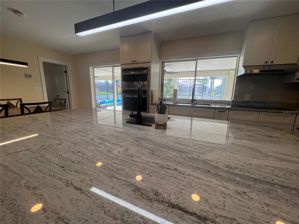2533 Rio Tiber Drive Punta Gorda, FL 33950 - Photo 29 of 43 a view of a livingroom with a chair and a fireplace