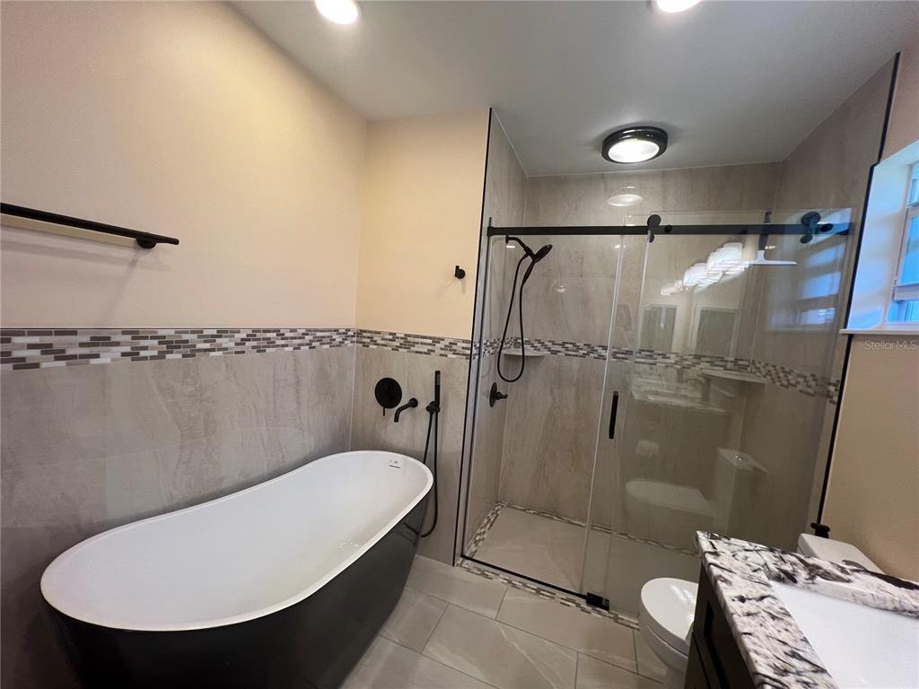 2533 Rio Tiber Drive Punta Gorda, FL 33950 - Photo 34 of 43 a bathroom with a sink toilet and shower