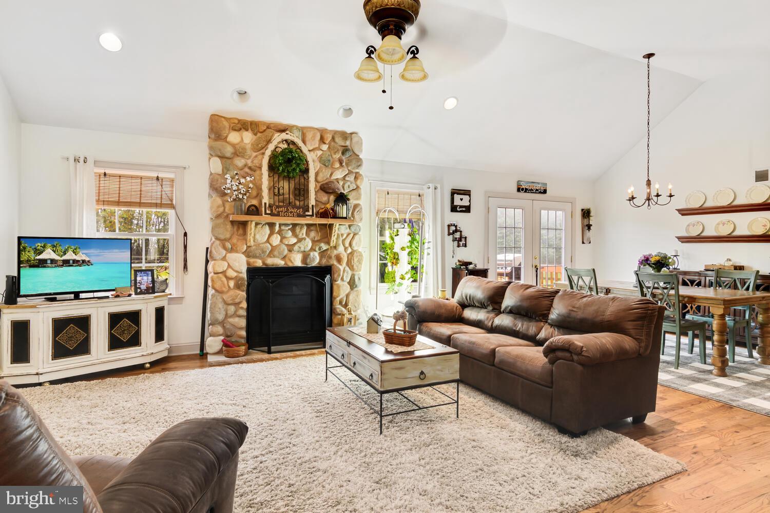 23287 Magnolia Hills Road Denton, MD 21629 - Photo 4 of 34 Stone gas fireplace in living room