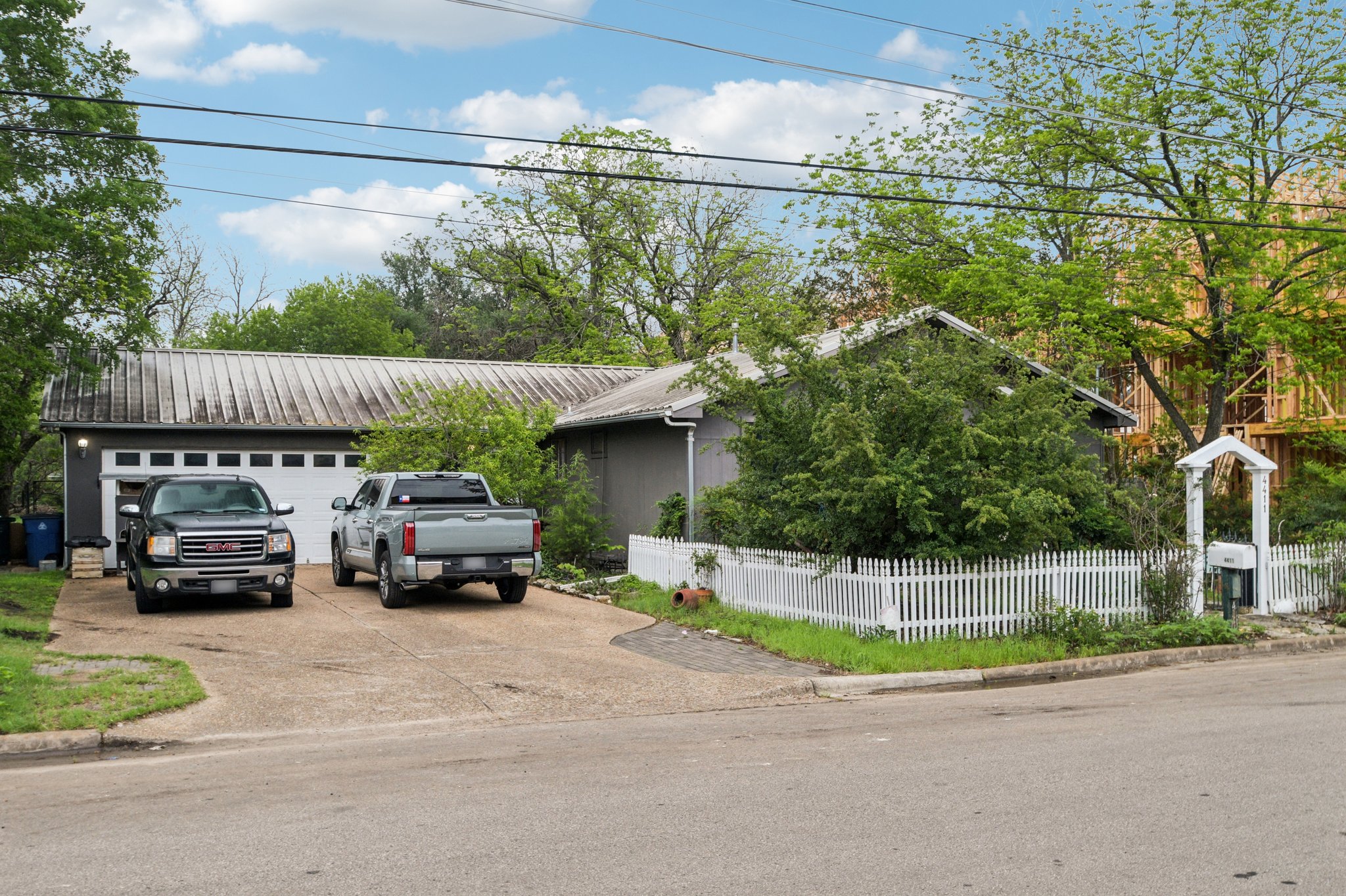 4411 Banister Lane Austin, TX 78745 - Photo 5 of 24 a view of street with parked cars
