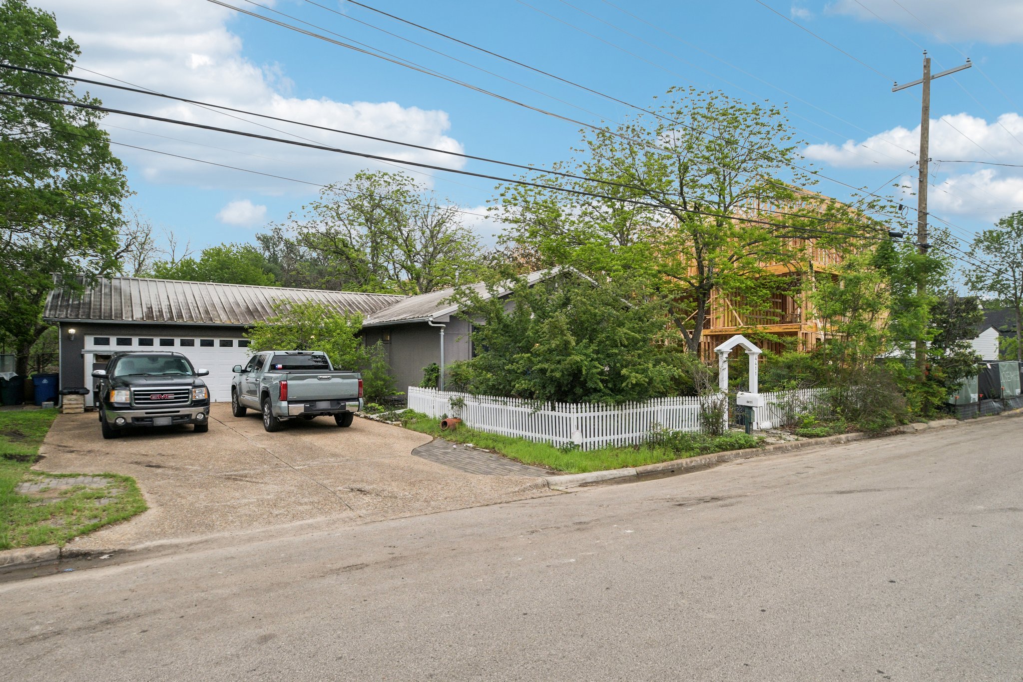 4411 Banister Lane Austin, TX 78745 - Photo 8 of 24 a view of backyard with a table and chairs and potted plants