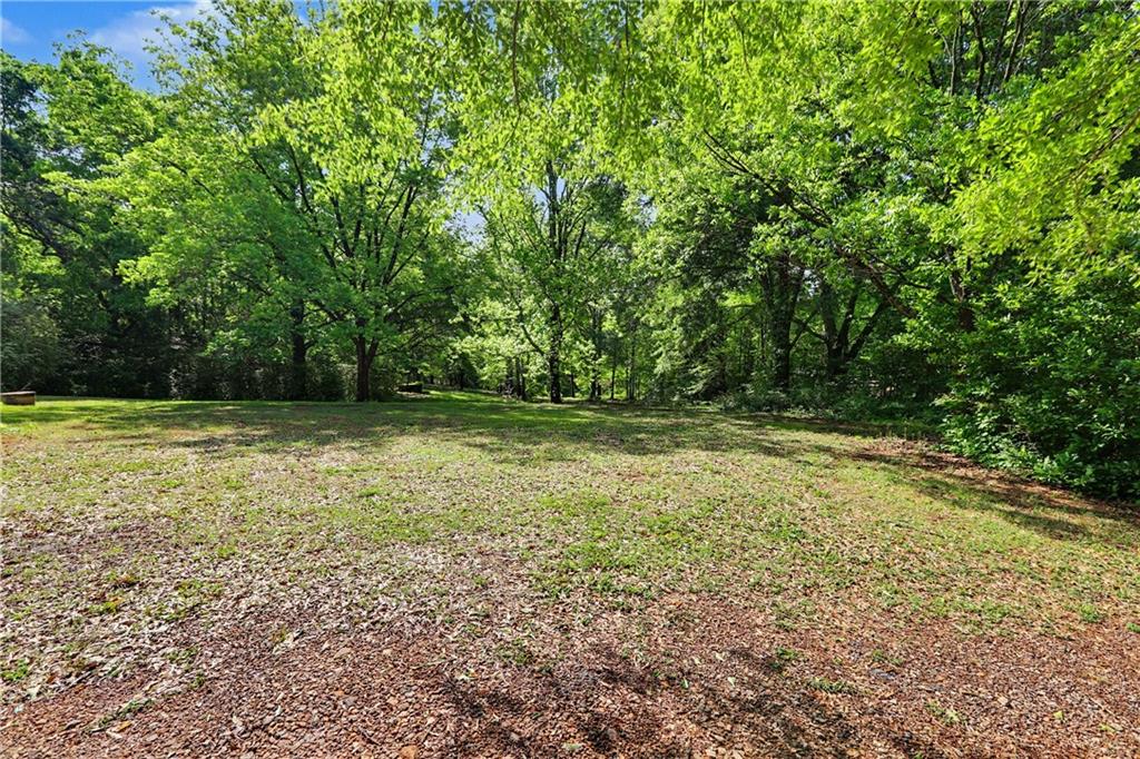 249 John Golden Road Temple, GA 30179 - Photo 6 of 45 a view of outdoor space with deck and yard