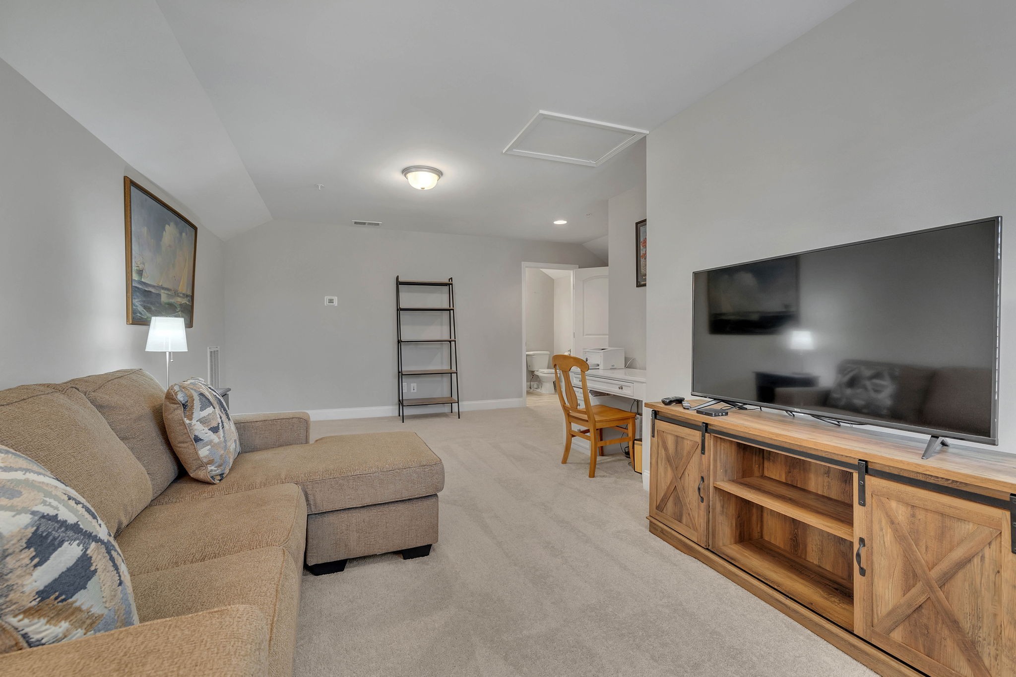 342 Buckner Cir Mount Mount Juliet, TN 37122 - Photo 31 of 40 a living room with furniture and a flat screen tv