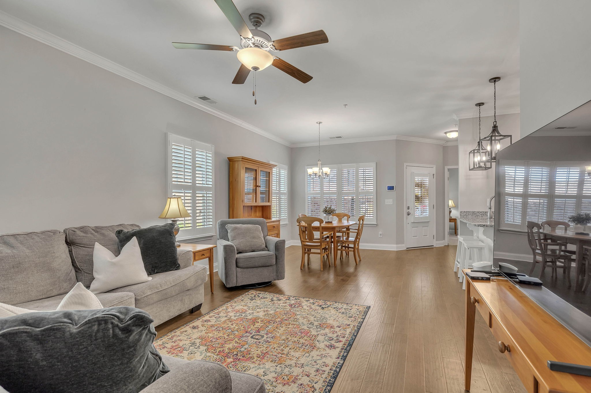 342 Buckner Cir Mount Mount Juliet, TN 37122 - Photo 9 of 40 a living room with furniture kitchen view and a chandelier