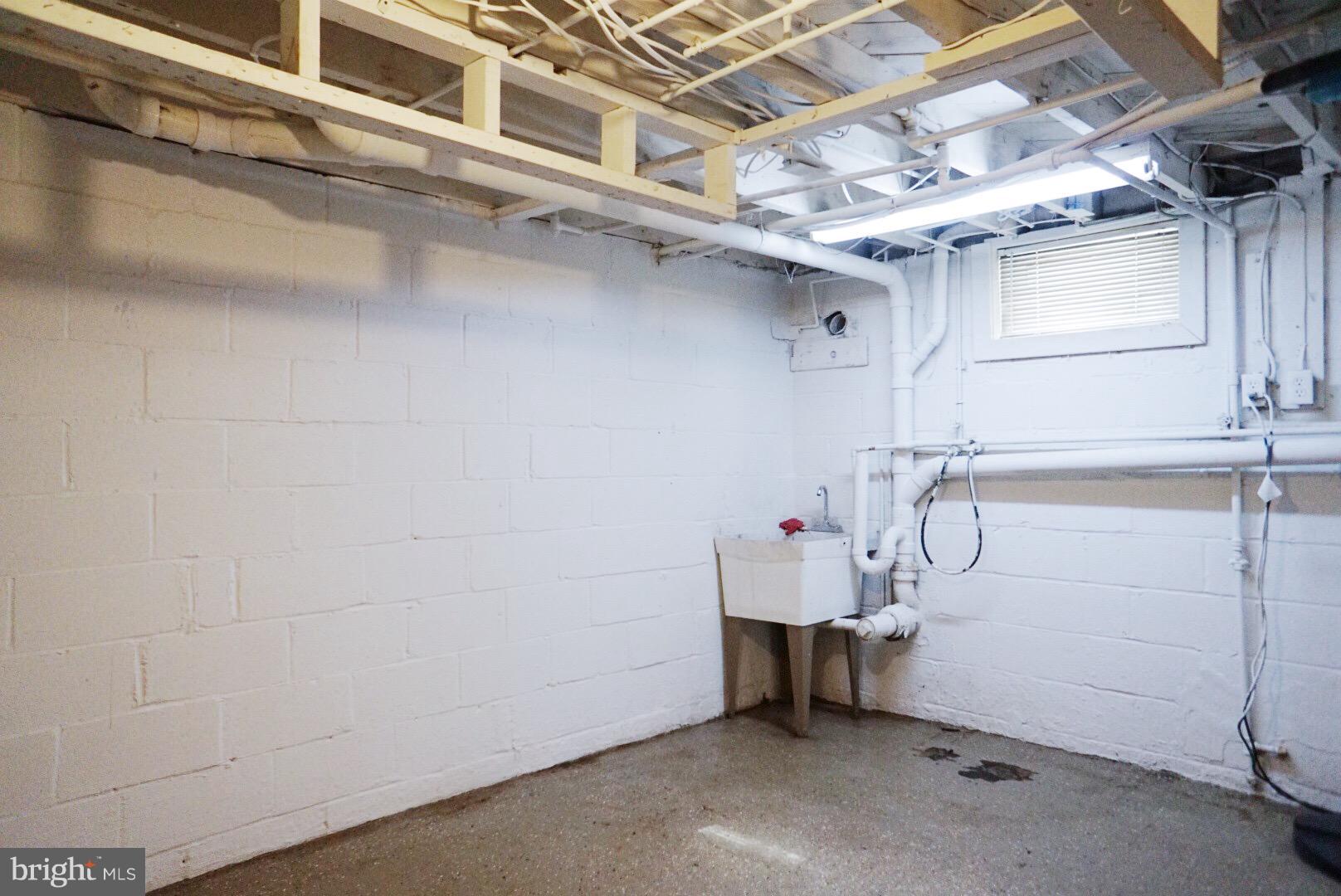 5215 Trumps Mill Road Baltimore, MD 21206 - Photo 25 of 27 LARGE LAUNDRY, UTILITY, STORAGE RM W/ FRESH PAINT