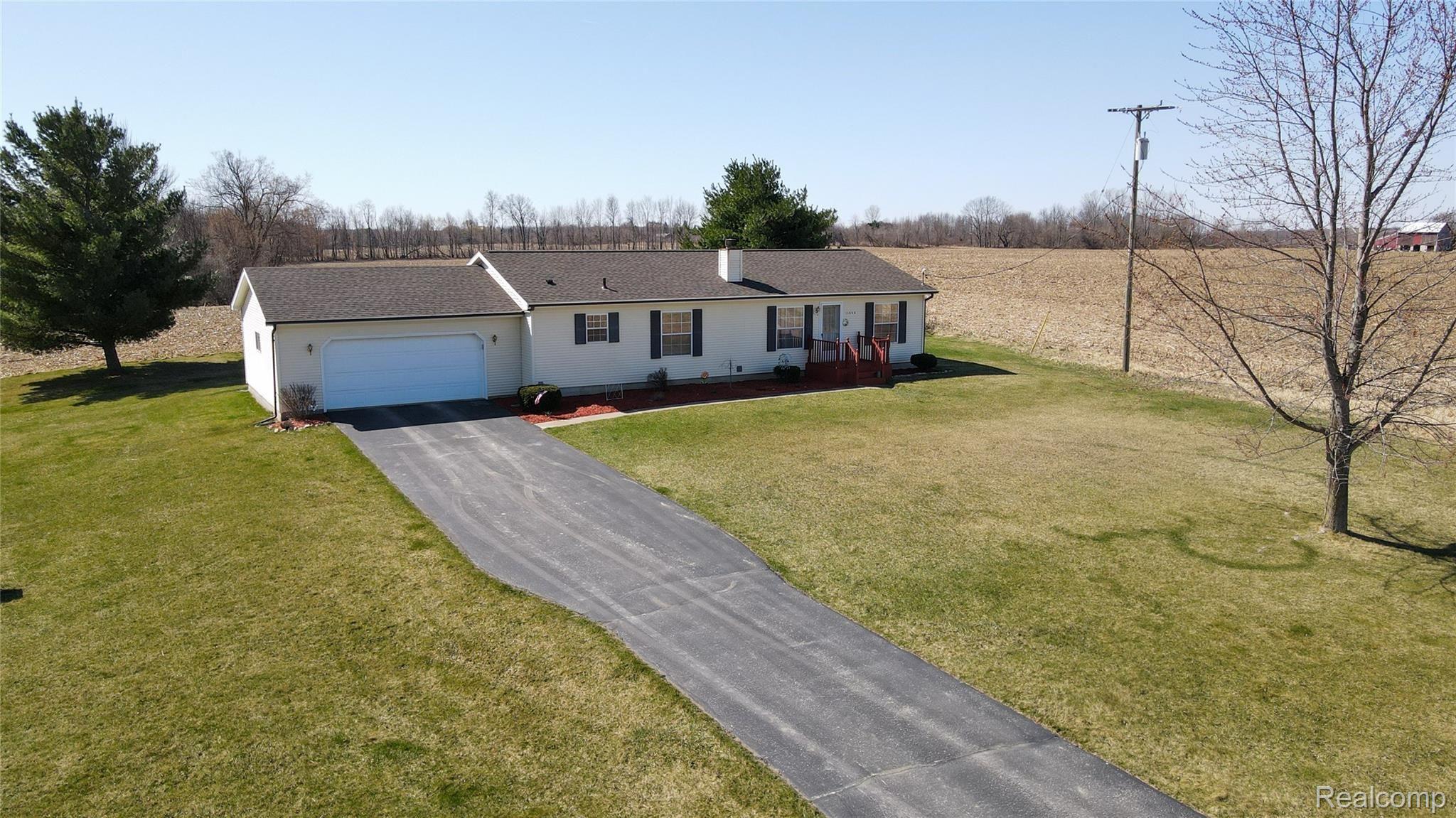 11595 West Sober Road Webberville, MI 48892 - Photo 1 of 42 11595 front3 - Copy.jpg