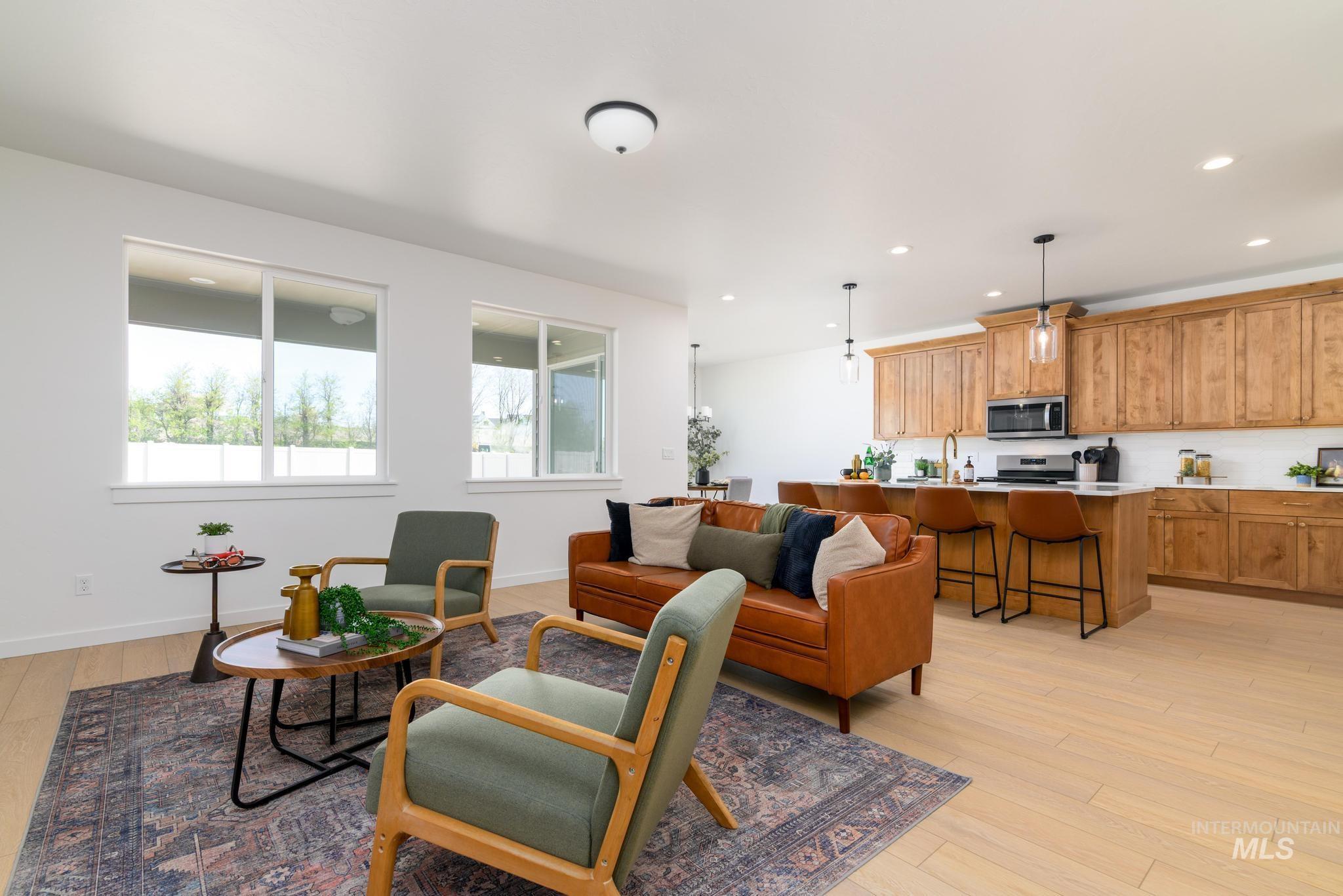 1671 West Arya Street Kuna, ID 83634 - Photo 2 of 12 Living area featuring light wood-type flooring and recessed lighting