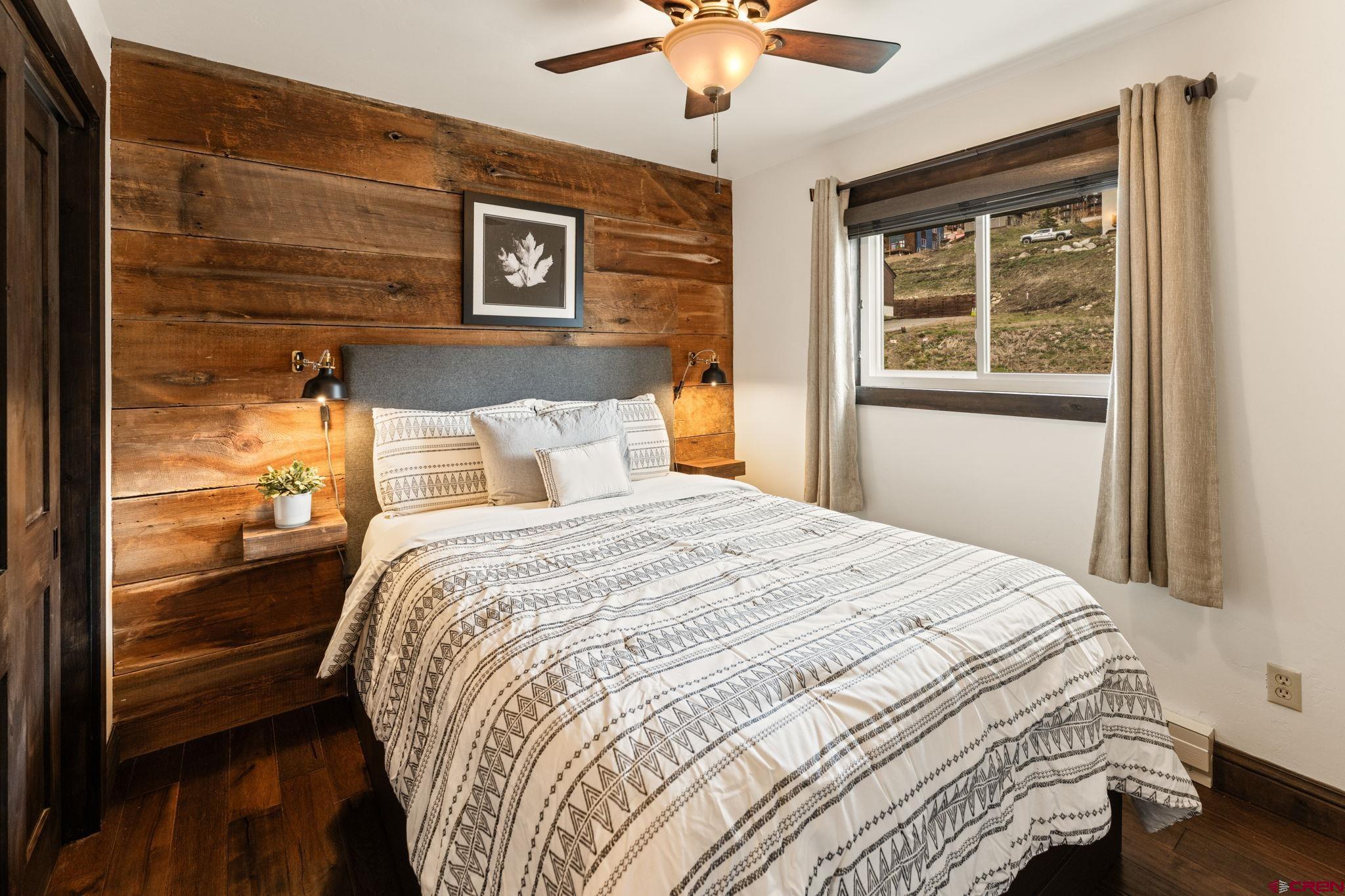 18 Crystal Road, Unit 5B Crested Butte, CO 81225 - Photo 11 of 25 a bedroom with a bed and a window