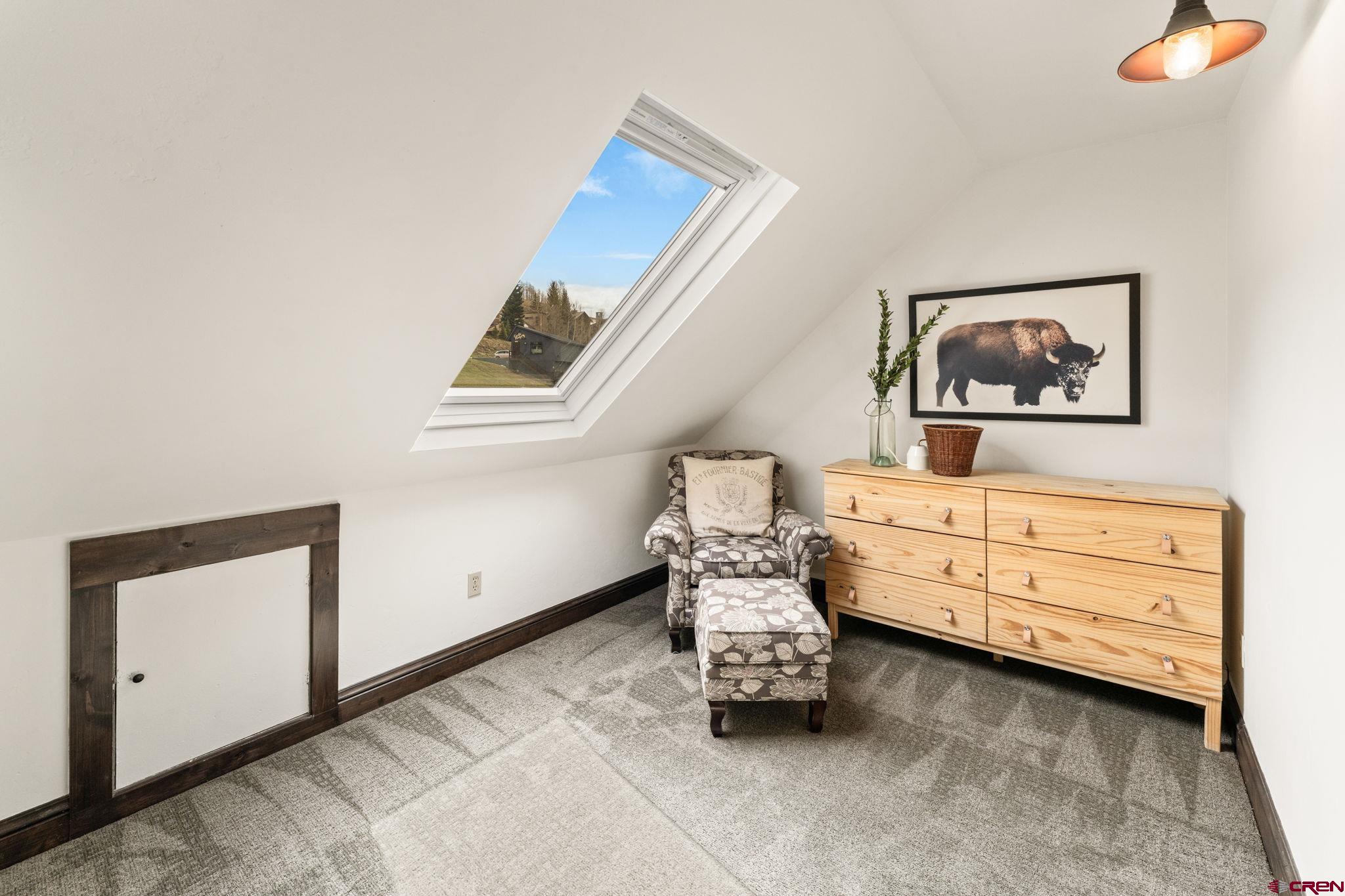 18 Crystal Road, Unit 5B Crested Butte, CO 81225 - Photo 18 of 25 a room with toys and baby crib