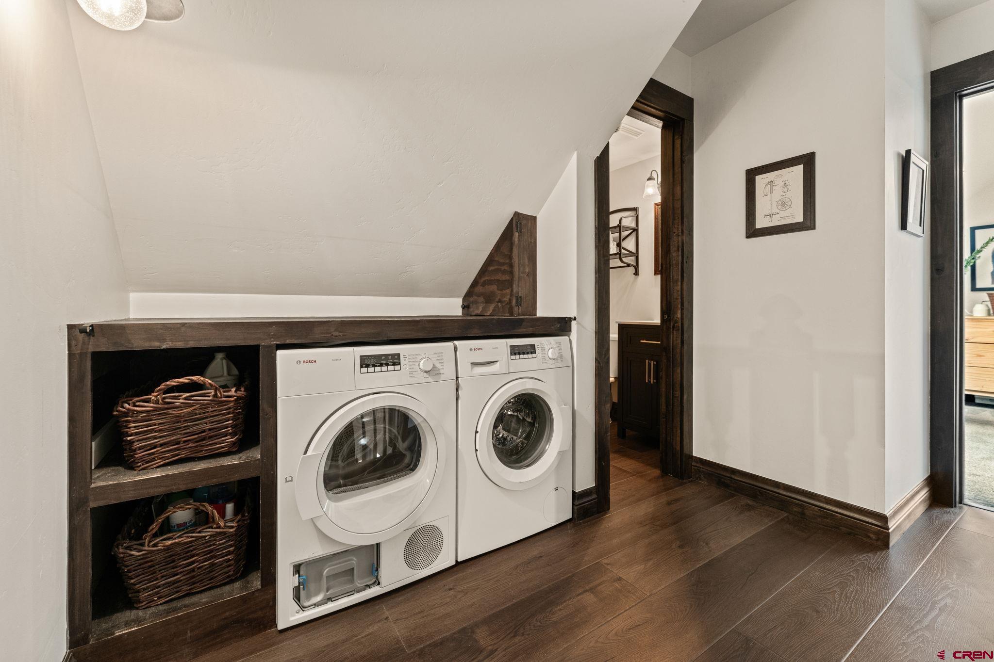 18 Crystal Road, Unit 5B Crested Butte, CO 81225 - Photo 20 of 25 a utility room with dryer and washer