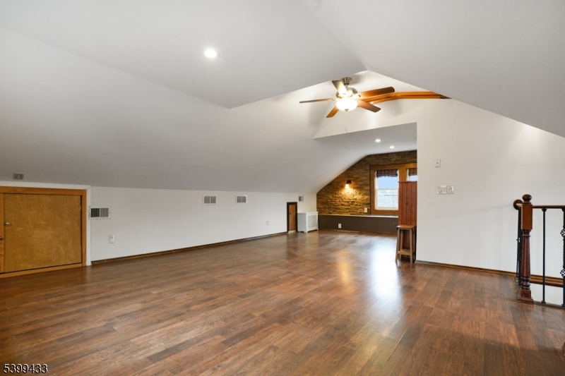 80 Locust Avenue Millburn, NJ 07041 - Photo 23 of 47 a view of empty room with wooden floor