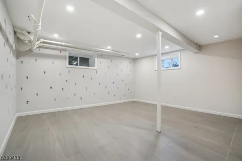 a view of an empty room with stairs