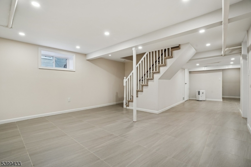 80 Locust Avenue Millburn, NJ 07041 - Photo 41 of 47 a view of an empty room with stairs