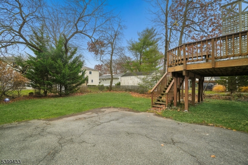 80 Locust Avenue Millburn, NJ 07041 - Photo 45 of 47 a view of backyard with green space