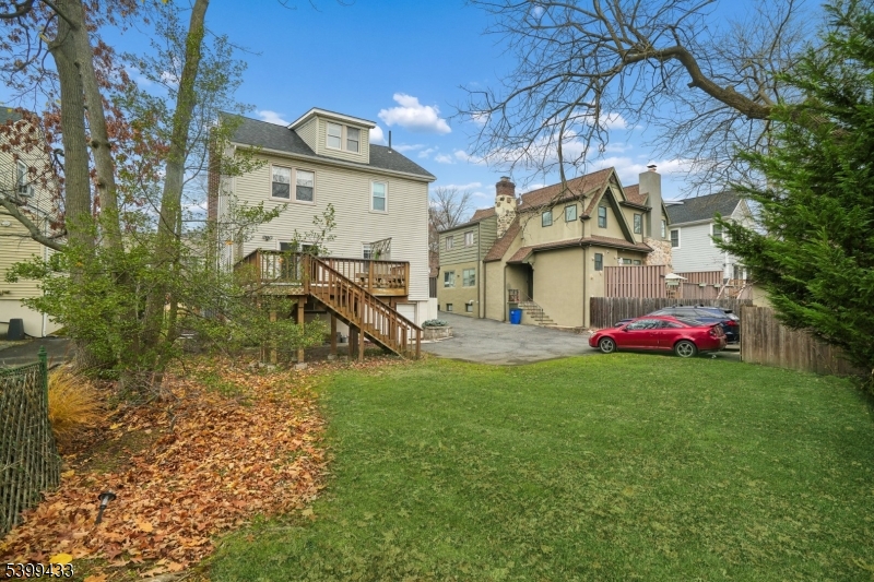 80 Locust Avenue Millburn, NJ 07041 - Photo 47 of 47 a view of a house with backyard and sitting area