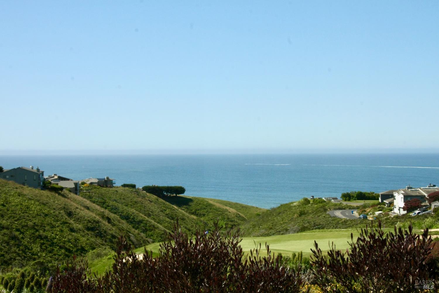 20690 Mockingbird Drive Bodega Bay, CA 94923 - Photo 15 of 51 a view of a lake and mountain in the back