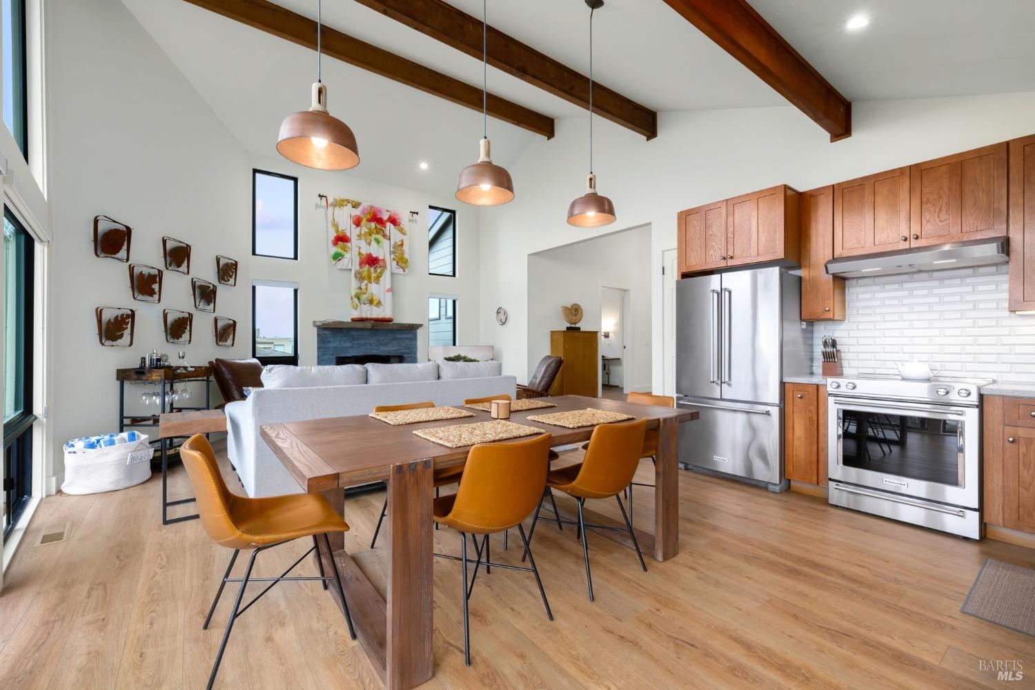 20690 Mockingbird Drive Bodega Bay, CA 94923 - Photo 16 of 51 a view of a dining room with furniture and wooden floor