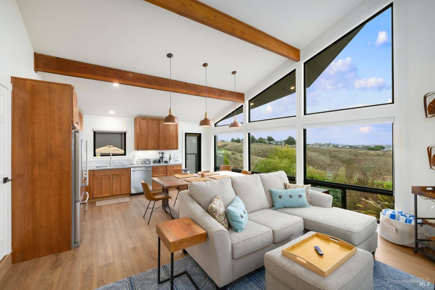20690 Mockingbird Drive Bodega Bay, CA 94923 - Photo 21 of 51 a living room with furniture and a large window