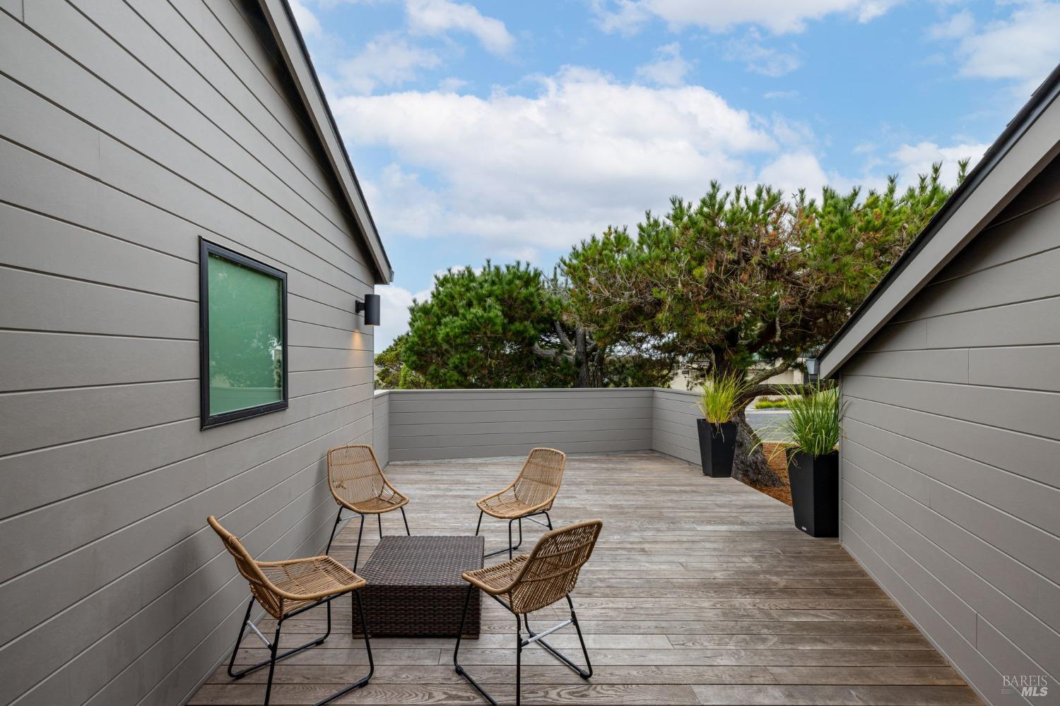 20690 Mockingbird Drive Bodega Bay, CA 94923 - Photo 30 of 51 a view of a chair and table in backyard of the house