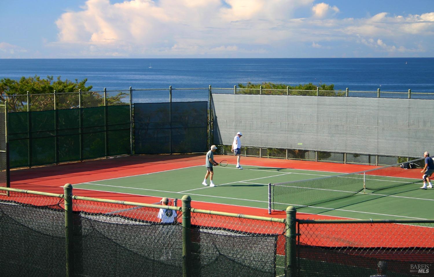20690 Mockingbird Drive Bodega Bay, CA 94923 - Photo 43 of 51 a wooden bench sitting in a yard