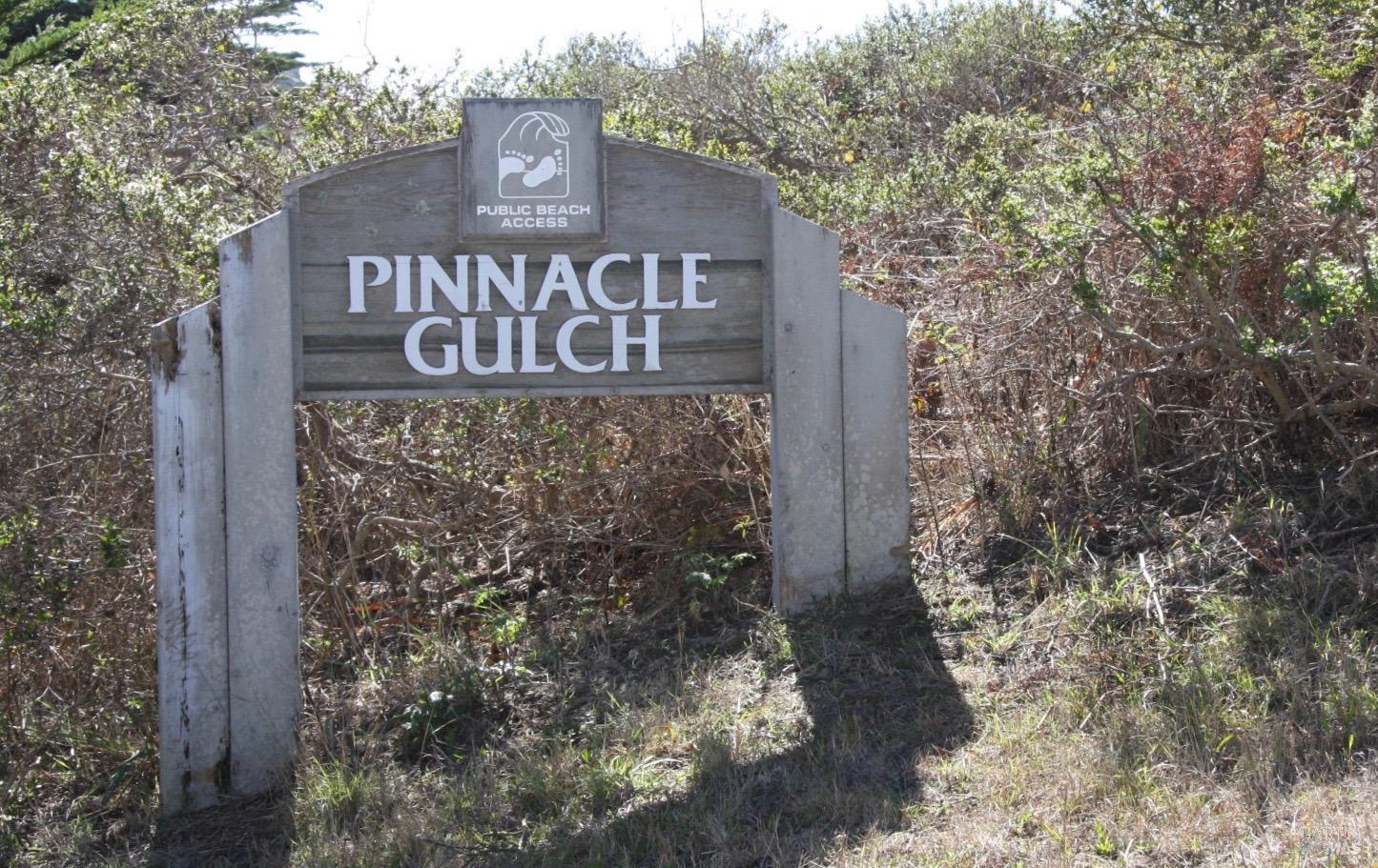 20690 Mockingbird Drive Bodega Bay, CA 94923 - Photo 50 of 51 a sign that is sitting on a brick wall