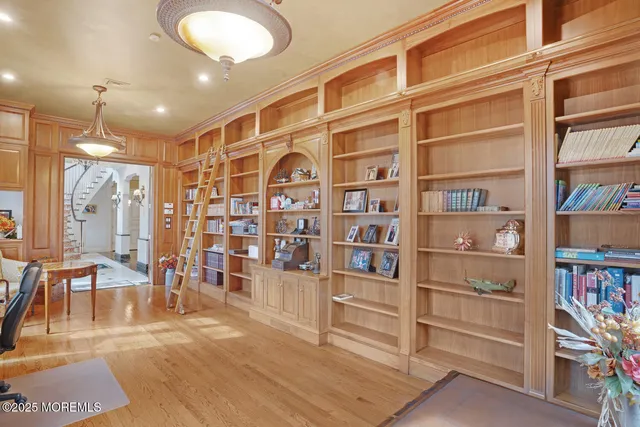 a spacious bathroom with a tub sink and shower