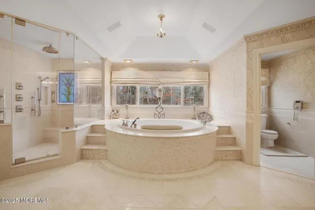 a view of a living room and bathroom